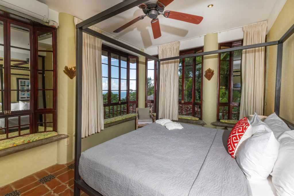 Each bedroom in this magnificent villa features a king-size bed, full air-conditioning, and breathtaking views of both the jungle and the ocean.