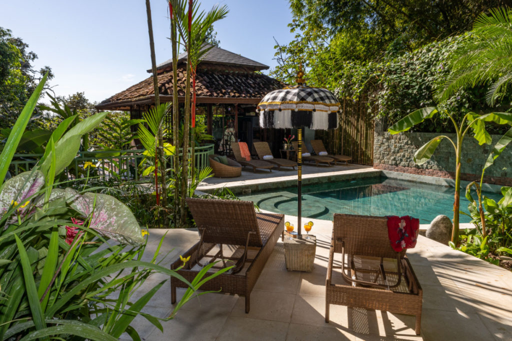 Relax in the deluxe poolside lounge, surrounded by exotic gardens.