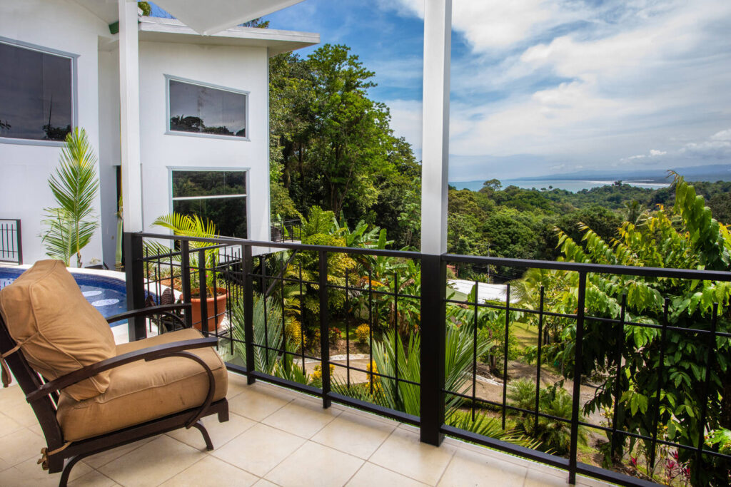 This amazing balcony next to the pool area is the perfect place to sit back and unwind.