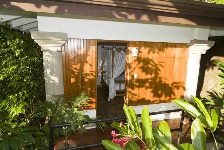 Guest cottage entrance surrounded by tropical plants in Manuel Antonio Costa Rica