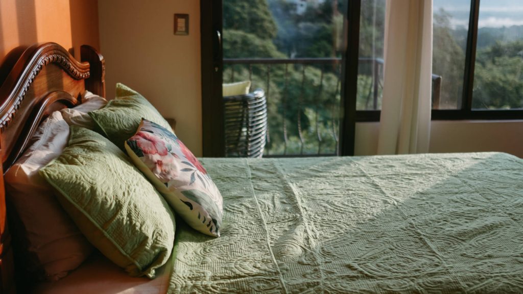 The bedrooms are tastefully decorated and have large windows with gorgeous rainforest views. 