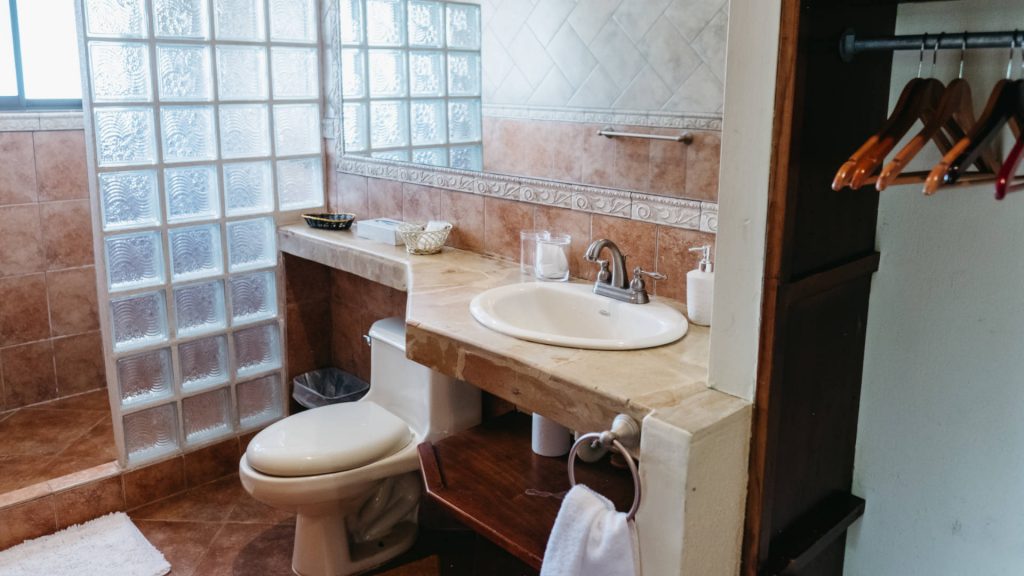The bathrooms have a natural feel that fits well with the beautiful decor of the villa.