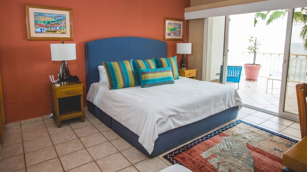 This bedroom has a balcony access so you can enjoy the beautiful views of the beach from your bedroom. 
