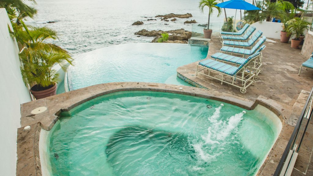 Relax poolside or in this jacuzzi and let the stress release out of your muscles. 