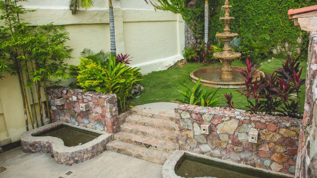 For some more relaxation time, you will enjoy this beautiful water fountain and garden area. 