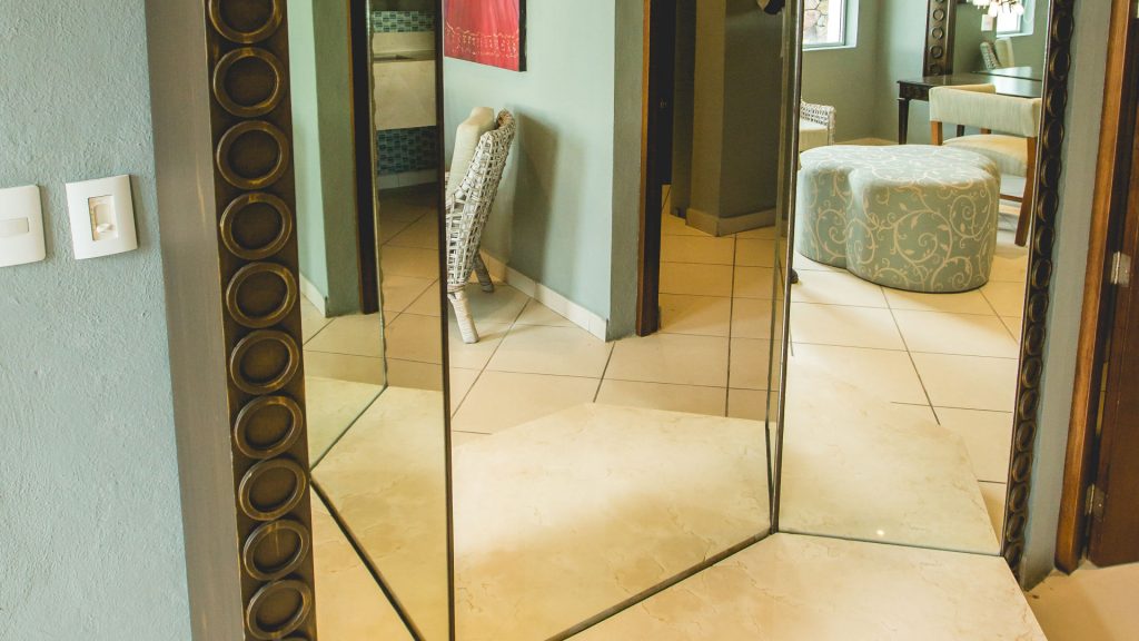 Floor to ceiling mirrors are great for making sure you look great before going out. 