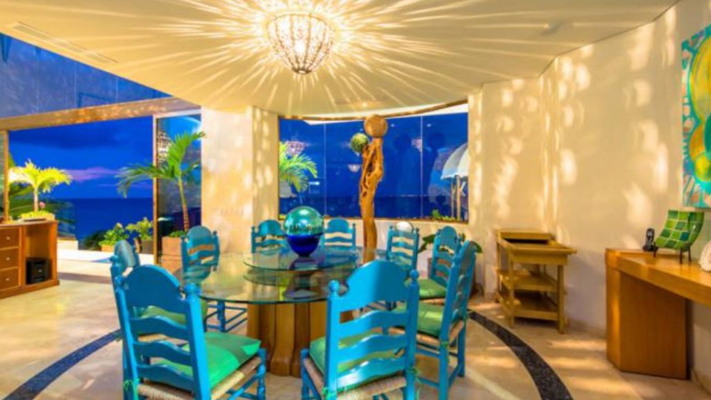 The dining room has a bright sylish feel with seating for nine family or friends.