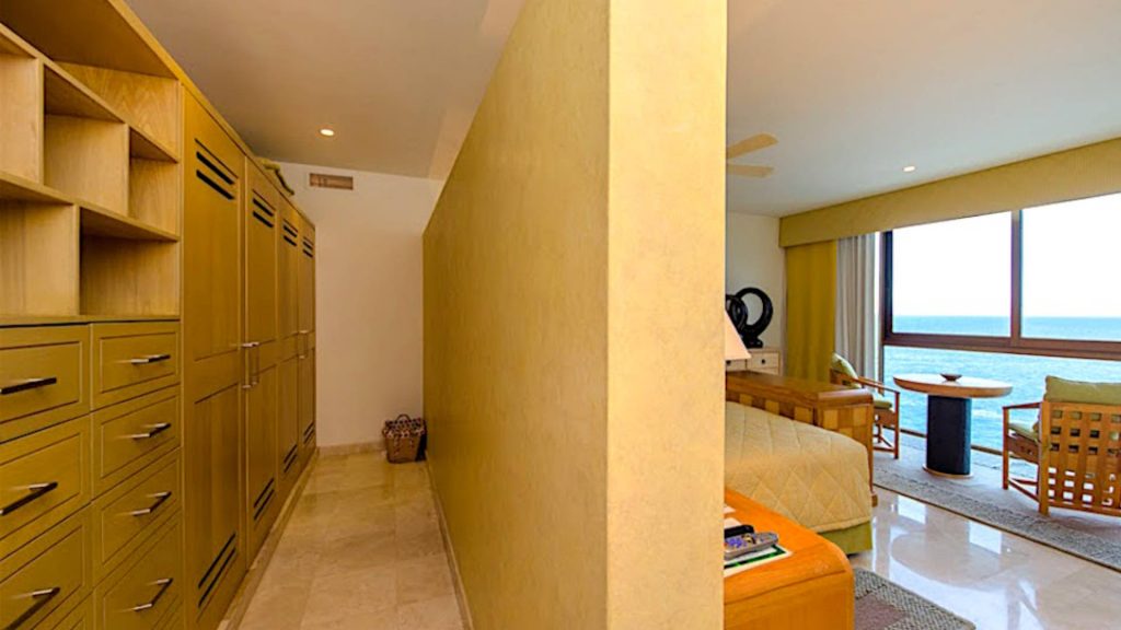 The closet is directly behind your bed for convenience of access. 