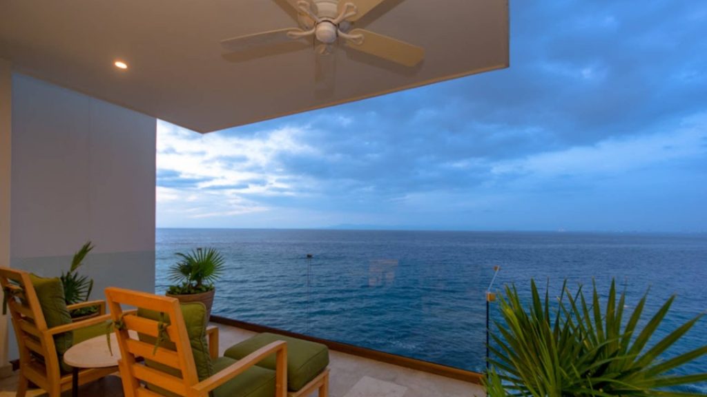 Simply relax and enjoy some great views on the balcony in the provided lounge chairs. 