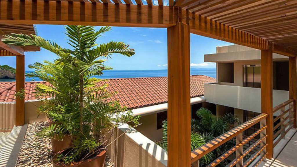 Around this whole vacation home you will have simply stunning views. Walk about the balcony above the center courtyard and see some of these coastal views. 