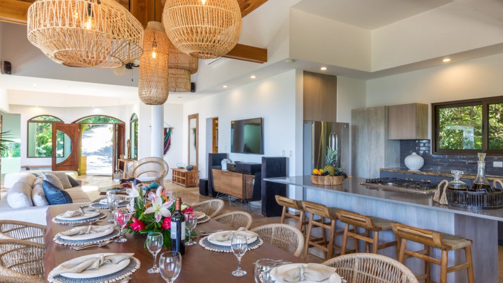 The open kitchen, dining, and living area is an amazing space to hang out with your family.