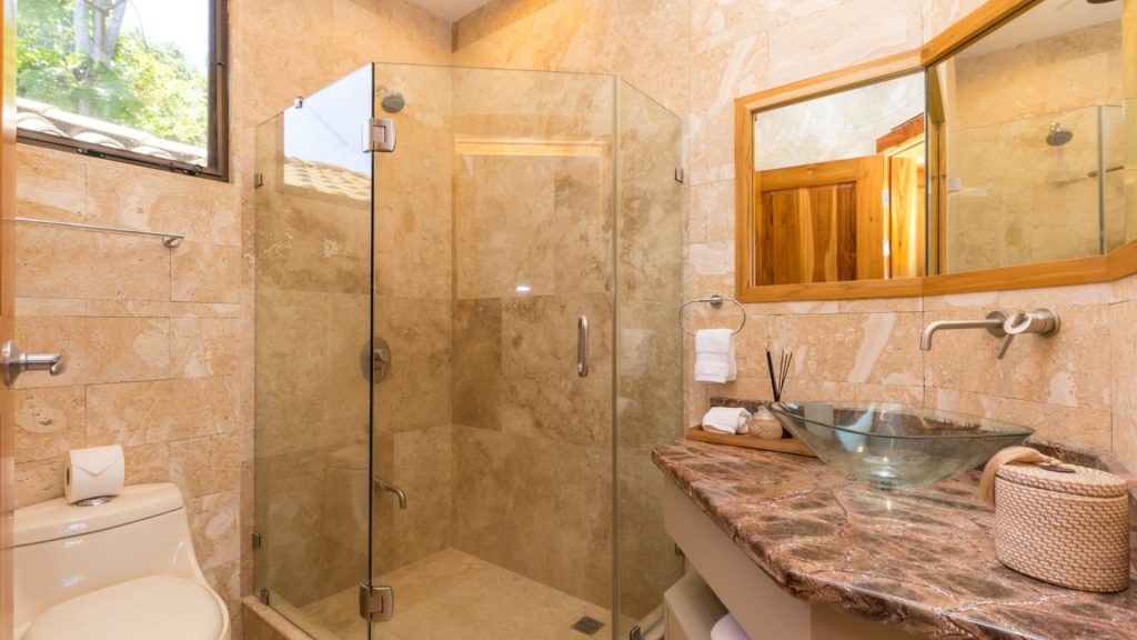 The ensuite bathrooms throughout the villa are spacious and beautifully designed.