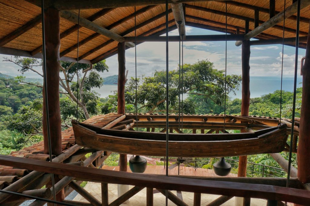 Nothing is ordinary in this unique villa, right down to the whimsical canoe suspended from the ceiling. 