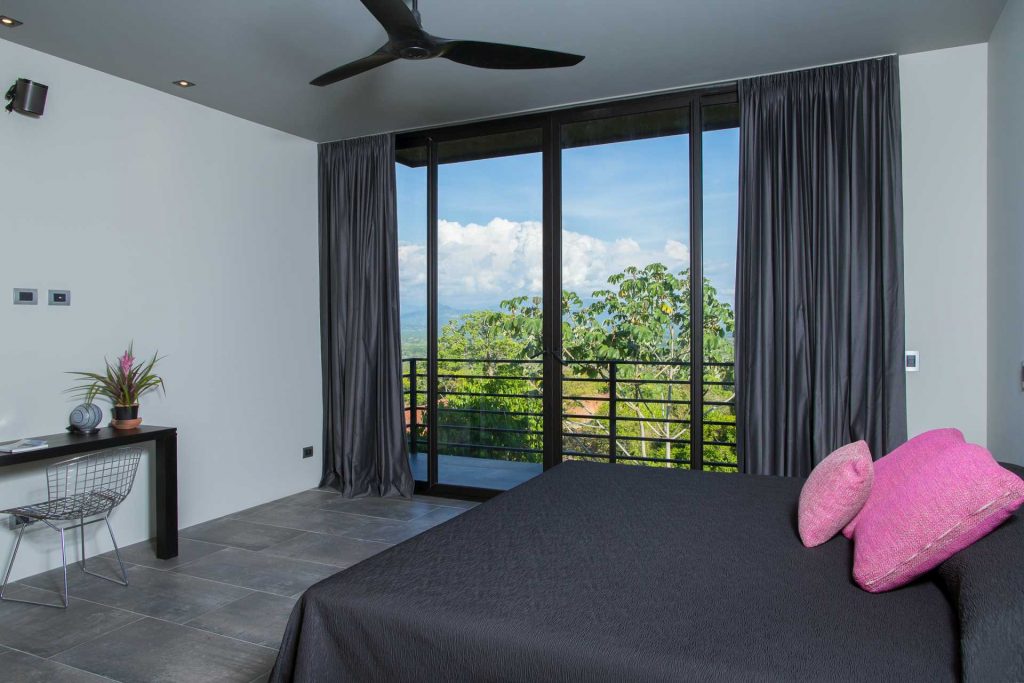 This villa features a modern clean design with exquisite furnishings and jungle, mountain, and Pacific views.