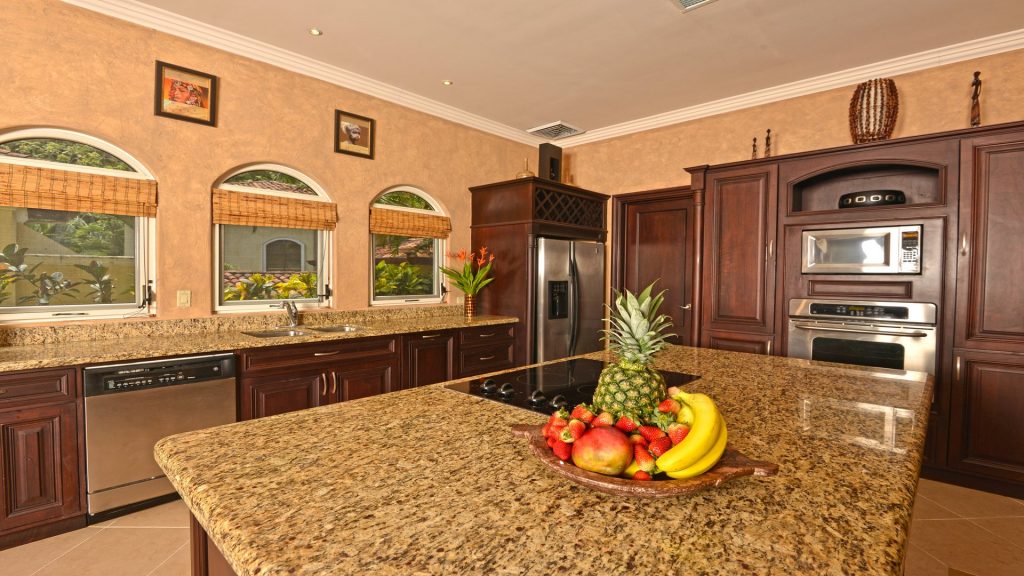 Enjoy preparing family meals in this stunning modern kitchen with a huge island.