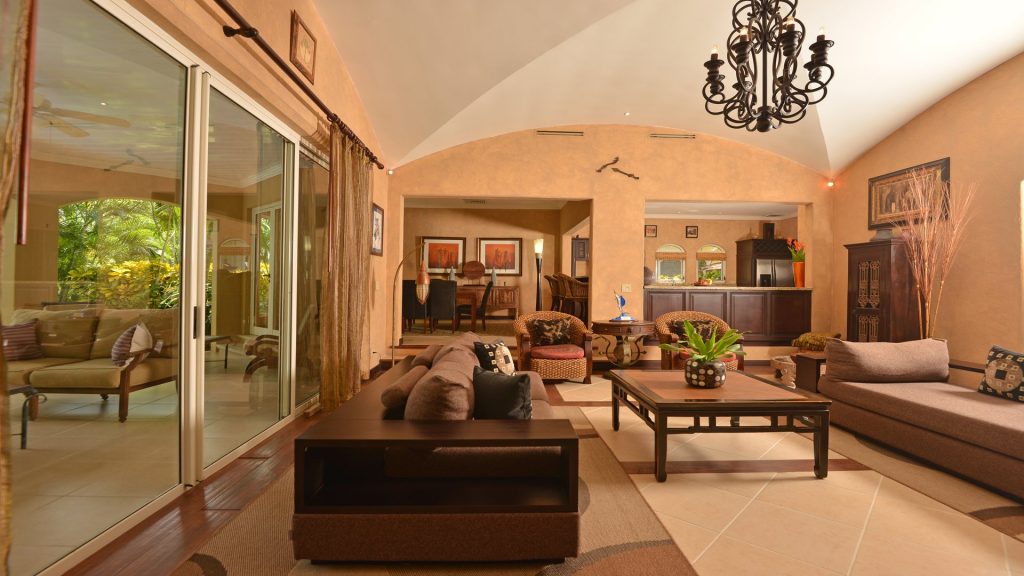 With large glass sliding doors, the living room can be opened up to the veranda for even more entertaining space.