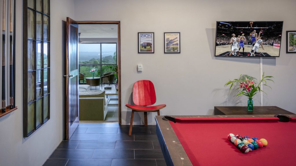 The games room on the main level of the villa is a great place to hang out with your group.