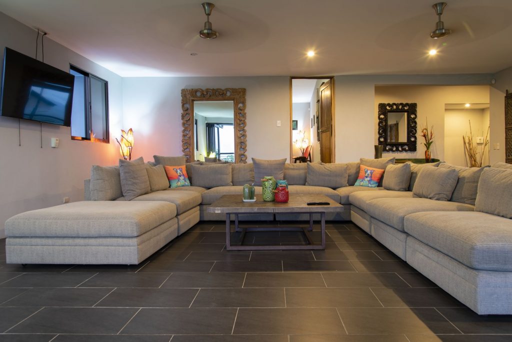 Play games, watch TV, or just relax on this giant sectional in the main living area.