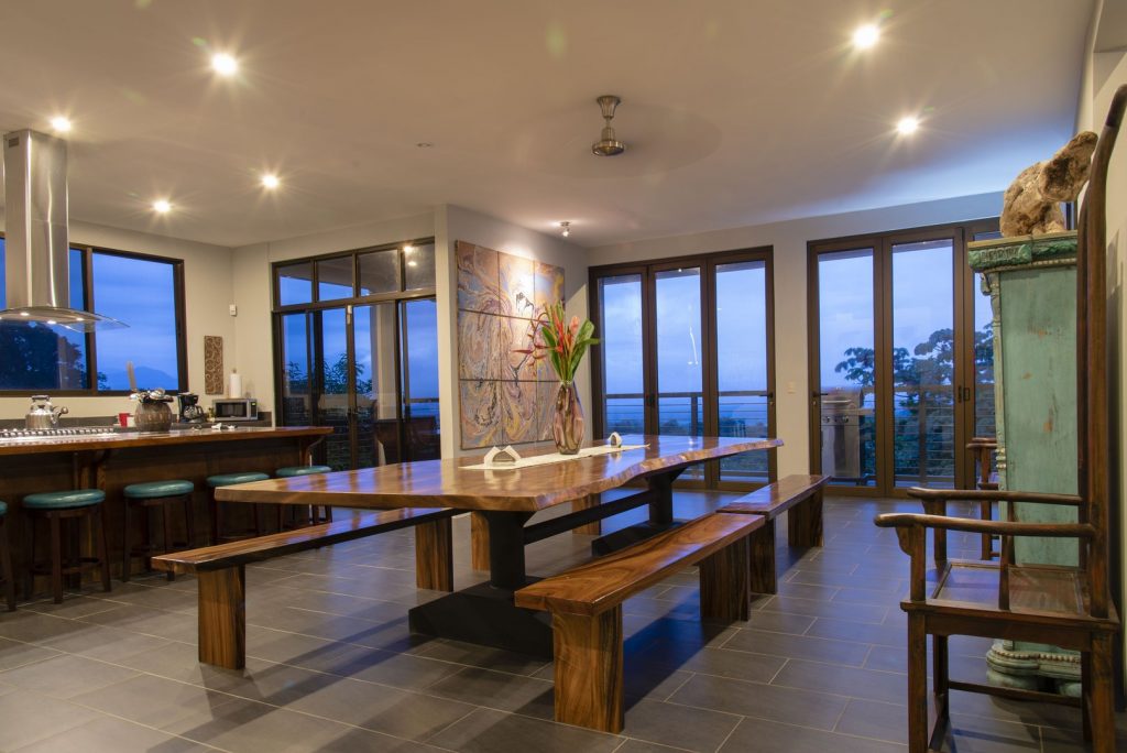 The amazing kitchen and dining room has a stunning view and is larger than the average hotel room in Manuel Antonio. 