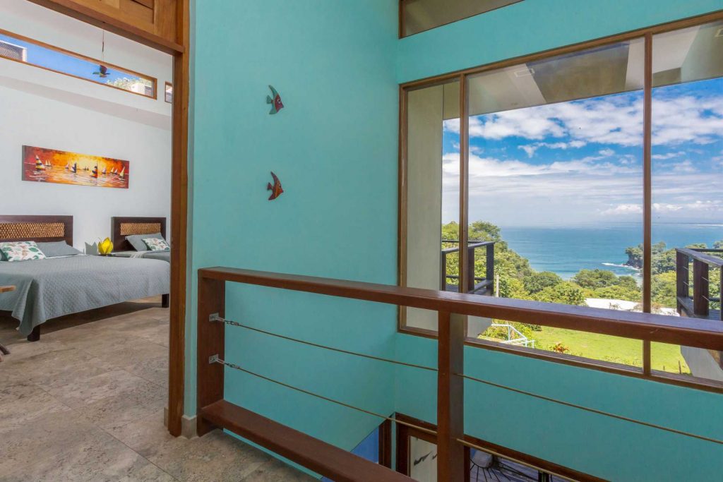 This large picture window on the second-floor landing offers another awesome ocean view. 