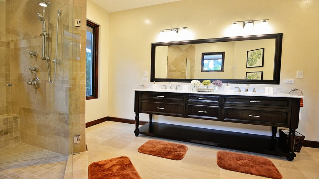 This awesome bathroom features clean lines and space for all family and friends alike