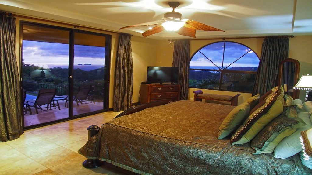 This charming yet elegant bedroom is only enhanced by the majestic views from this view while in Flamingo
