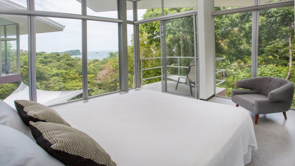 This queen bedroom has its own private balcony on the 2nd level with an amazing ocean view.