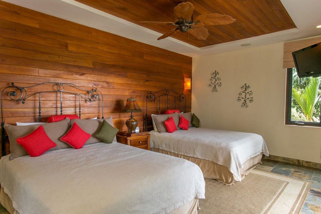 This Manuel Antonio home has wooden accents and fine furnishings throughout.