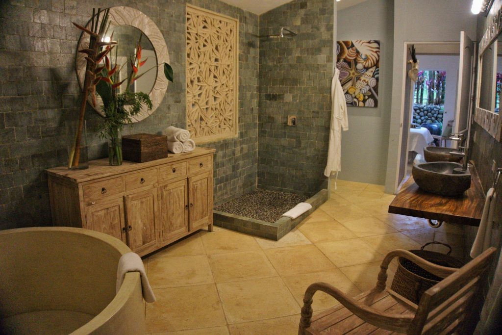Natural materials including granite and native woods were used in the incredible master bathroom.