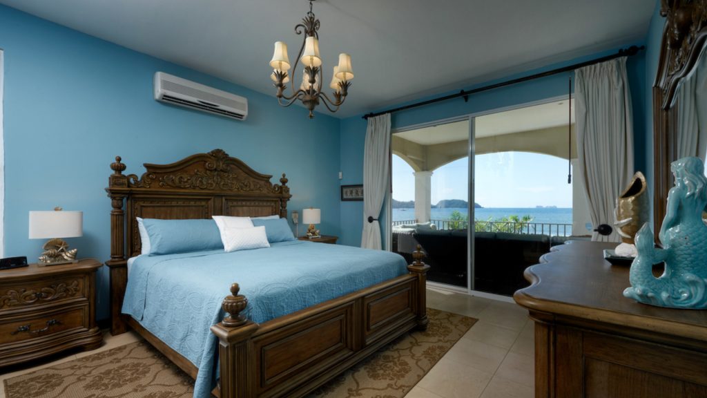 This bedroom sits on the other side of the porch and give you a wide angle view of the Pacific ocean.