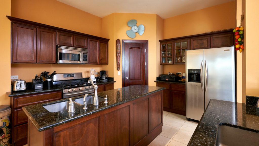 A fully equipped kitchen with modern appliances is just what you need.