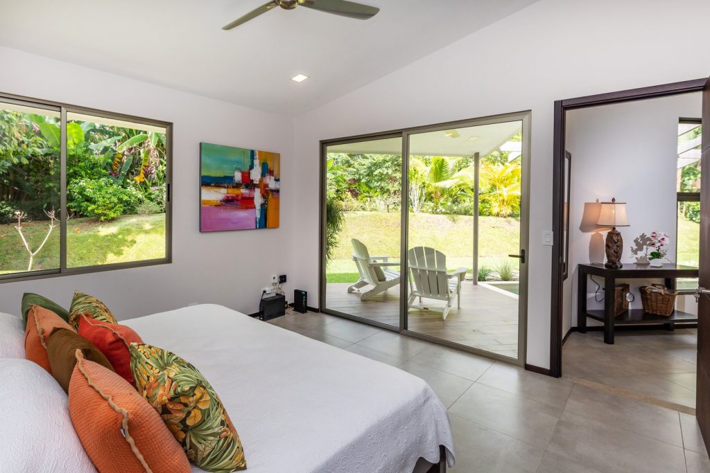 Wake up to the view of a beautiful tropical garden.