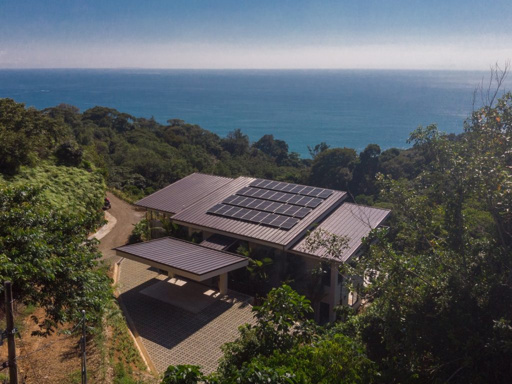 Huge solar panels across the roof make this villa an eco-friendly home.