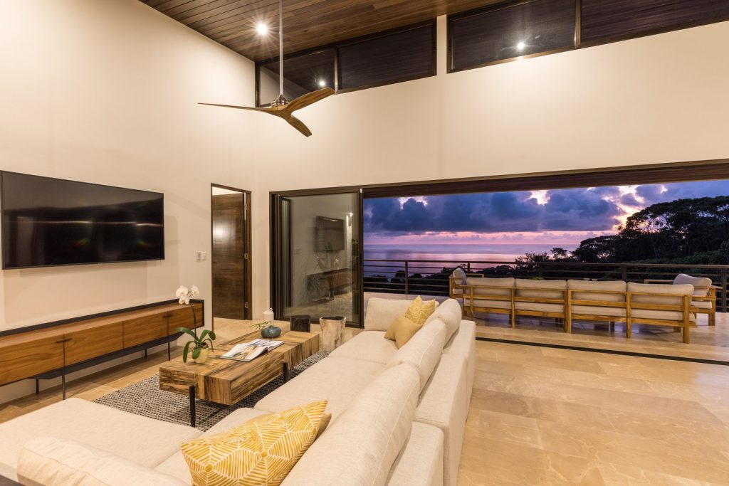 This modern living area is the perfect space to relax with family after a fun day at the beach.