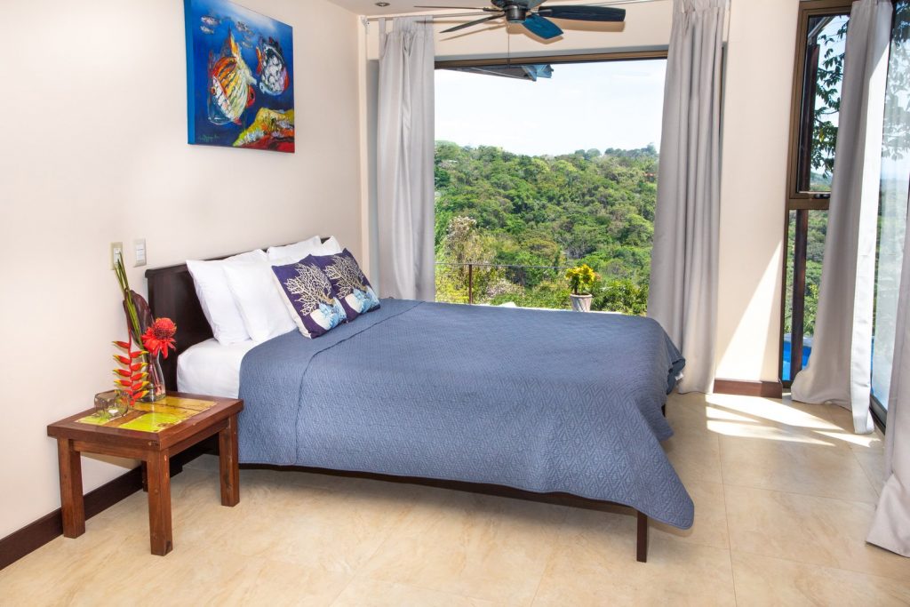 This queen bedroom has a private entrance off the pool deck and an ensuite bathroom. 