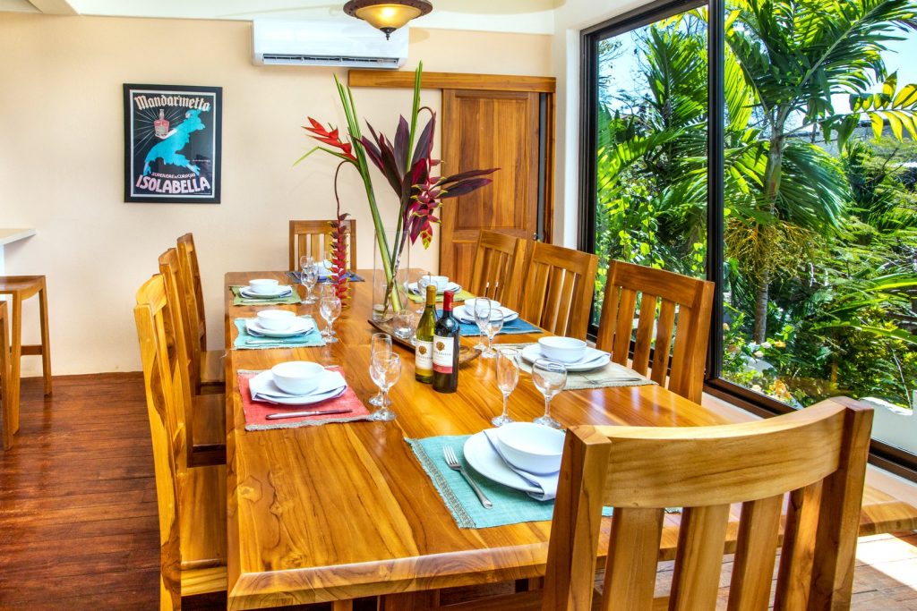 Your group will enjoy dining on this large table for eight with a spectacular ocean view through large glass windows. 