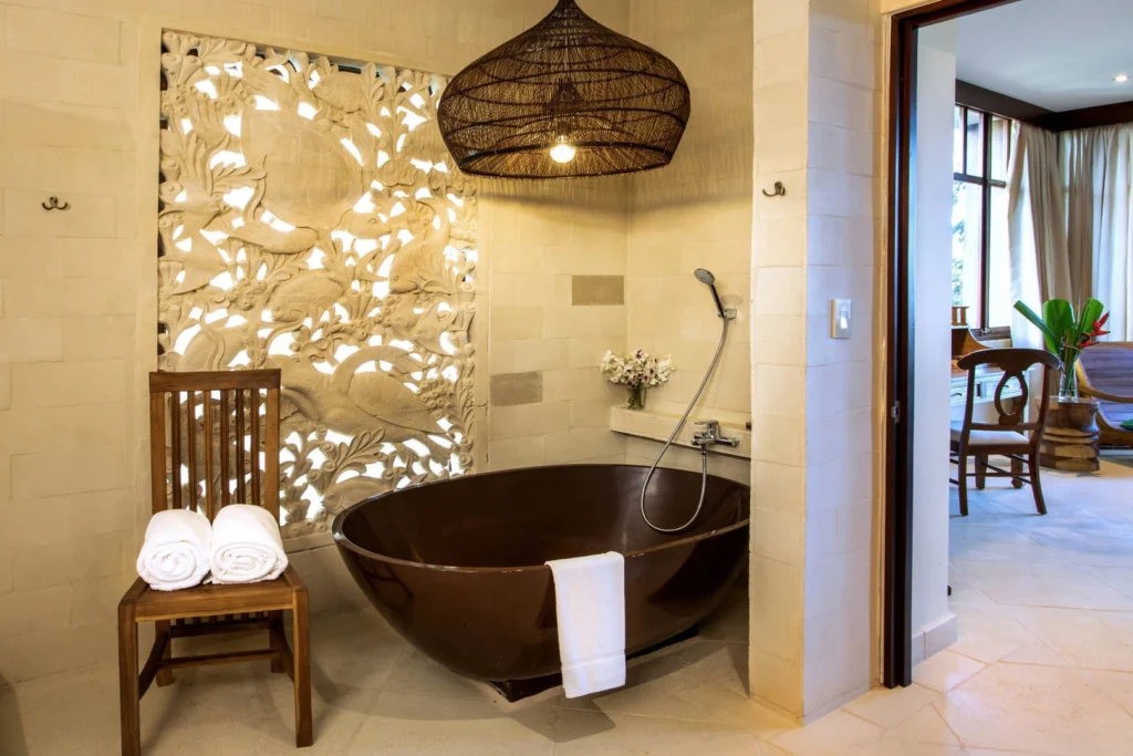 A peaceful, spa-inspired bathroom where handcrafted details, soft lighting, and a sculptural tub create a soothing place to unwind.