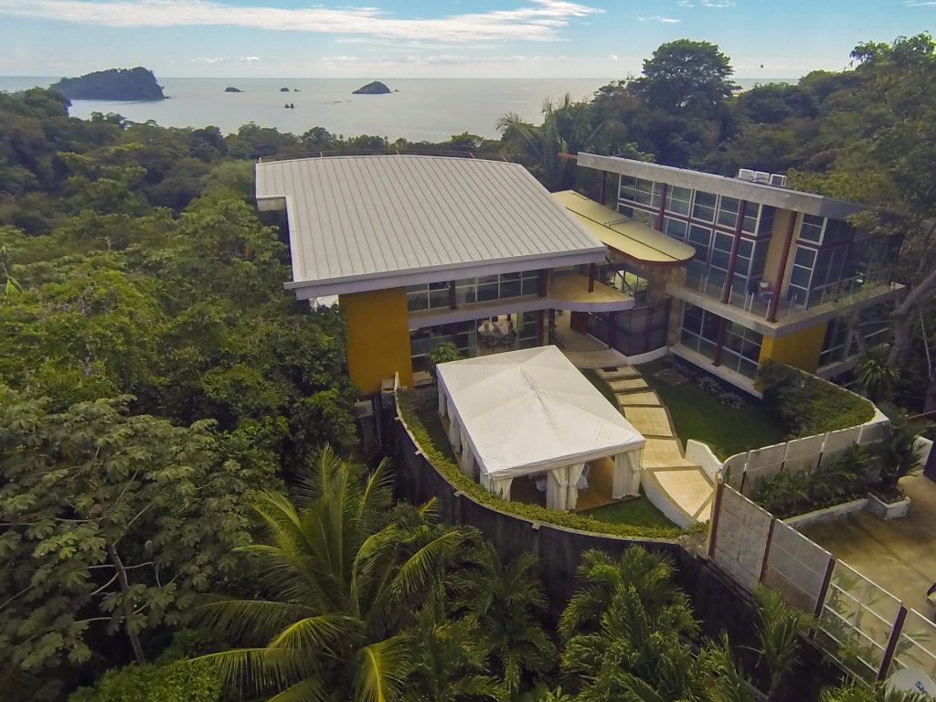 This aerial view shows the spectacular layout and location of the villa surrounded by lush rainforest. 