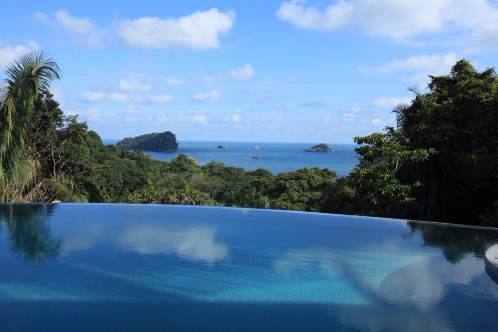 The infinity pool seems to reach right down to the ocean. The beach is only minutes away from the villa. 