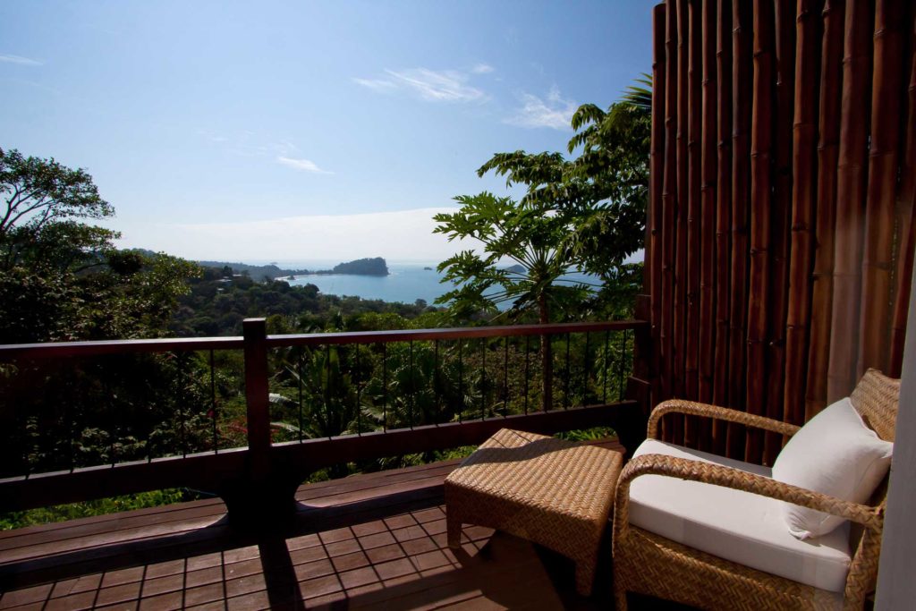 Watch for monkeys and toucans as you enjoy morning coffee on this stunning ocean-view balcony.