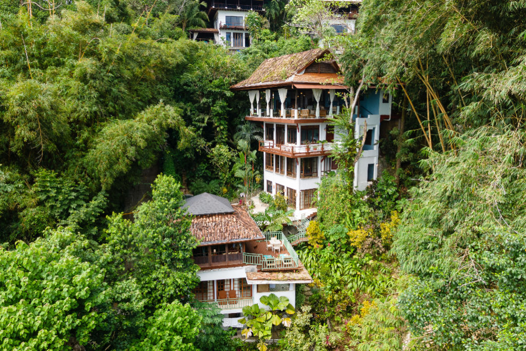 Within the lush rainforest of Manuel Antonio, the main house and the pool house provide a tranquil escape.