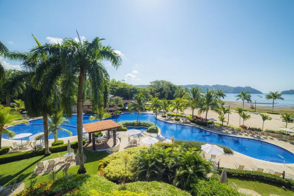 Just minutes away, the awesome beach club has a gorgeous pool—and yes, the swim-up bar does great pizza.