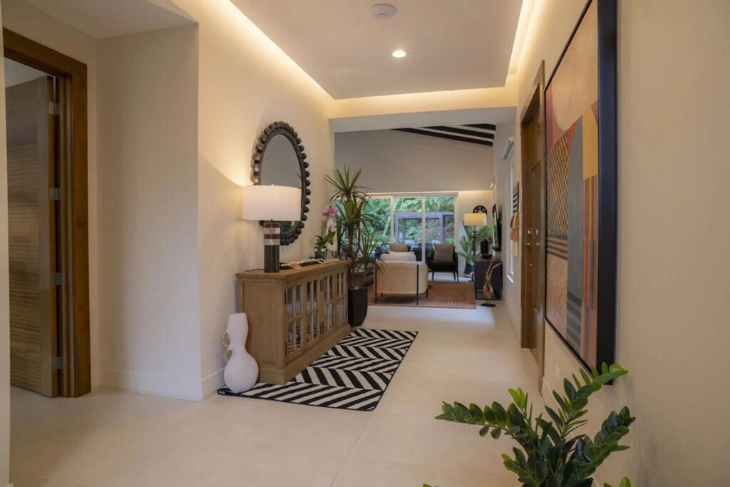 A warm, welcoming entrance gives you a taste of this home’s stylish architecture.