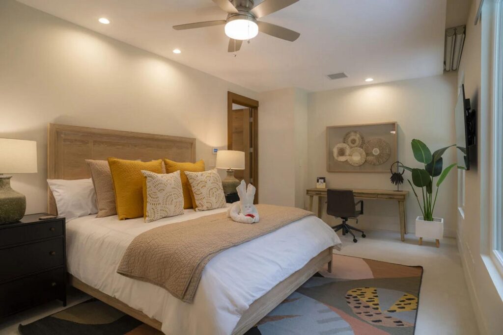 Need to squeeze in a little work? This bedroom includes a quiet corner to focus.