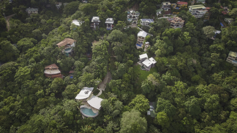 Aerial view of luxury villas surrounded by dense jungle in Manuel Antonio Costa Rica