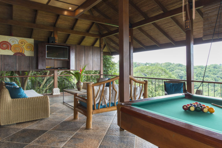 Game room with pool table and open jungle views in Manuel Antonio Costa Rica