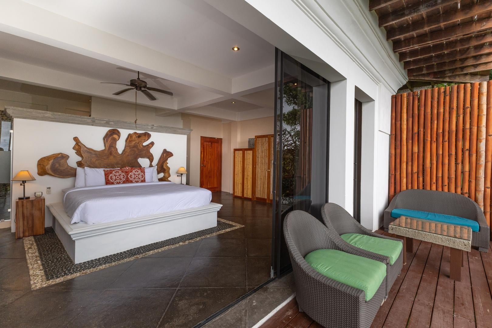 King bedroom with large windows and natural light in Manuel Antonio Costa Rica villa