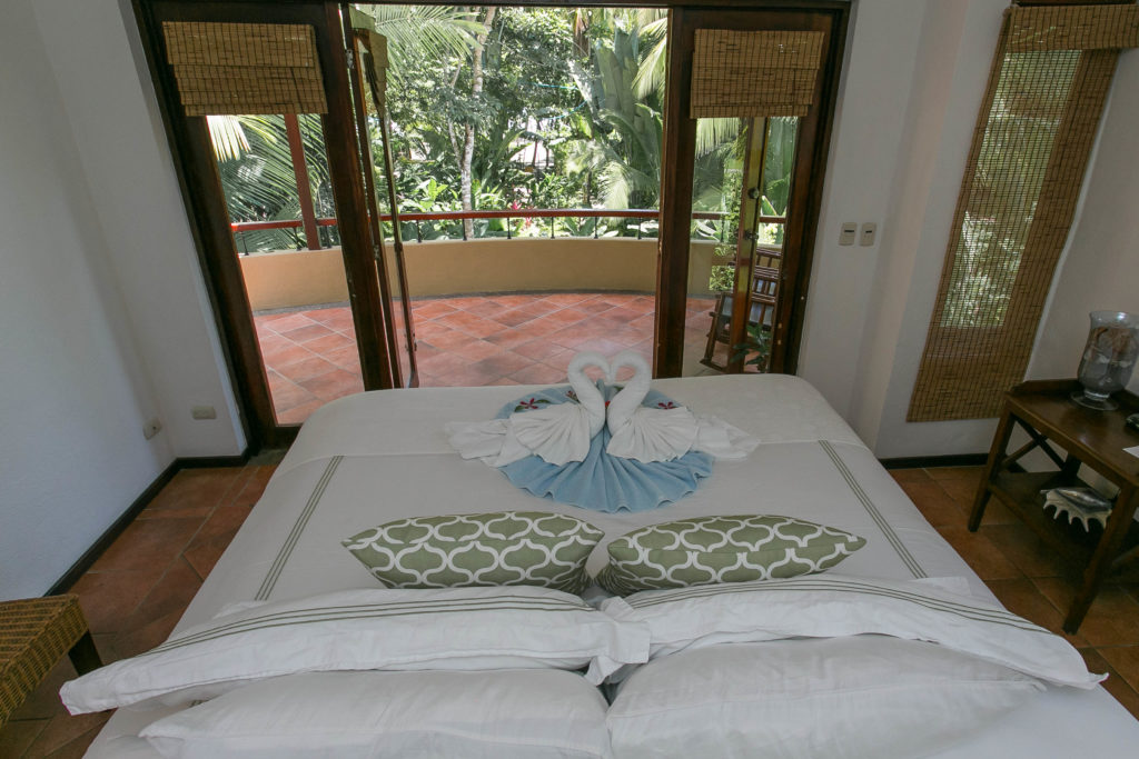 Enjoy the view from your bed or the terrace in one of the only beachfront properties in Manuel Antonio.