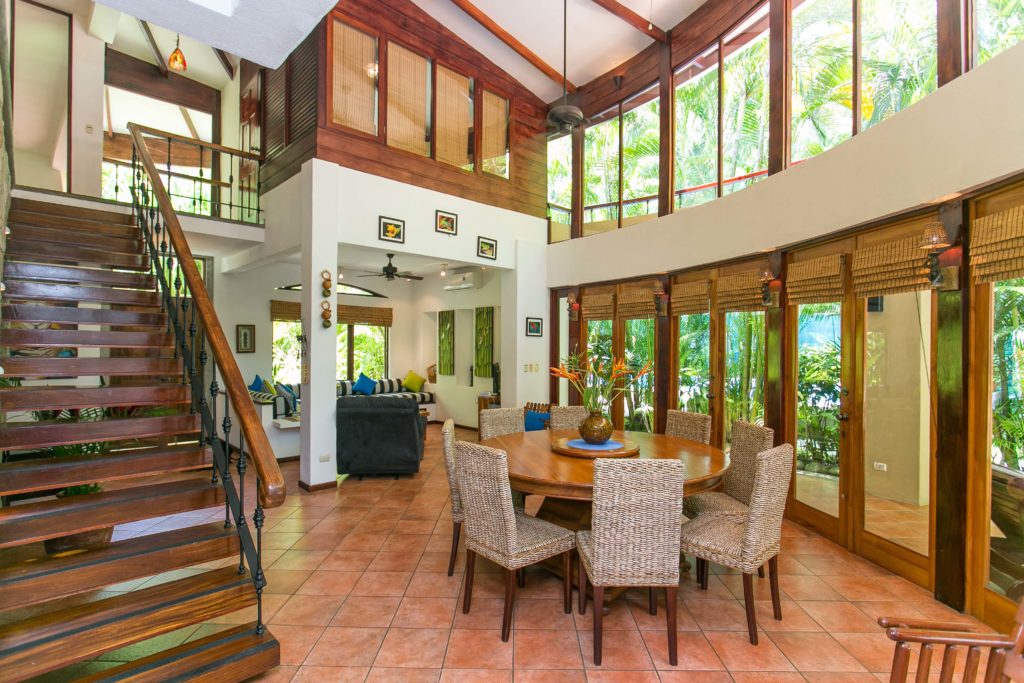 The amazing open-plan great room opens up to the patio and pool area and you can walk to the beach in seconds.