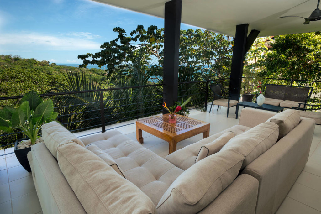 Cozy sitting area with jungle and ocean views.